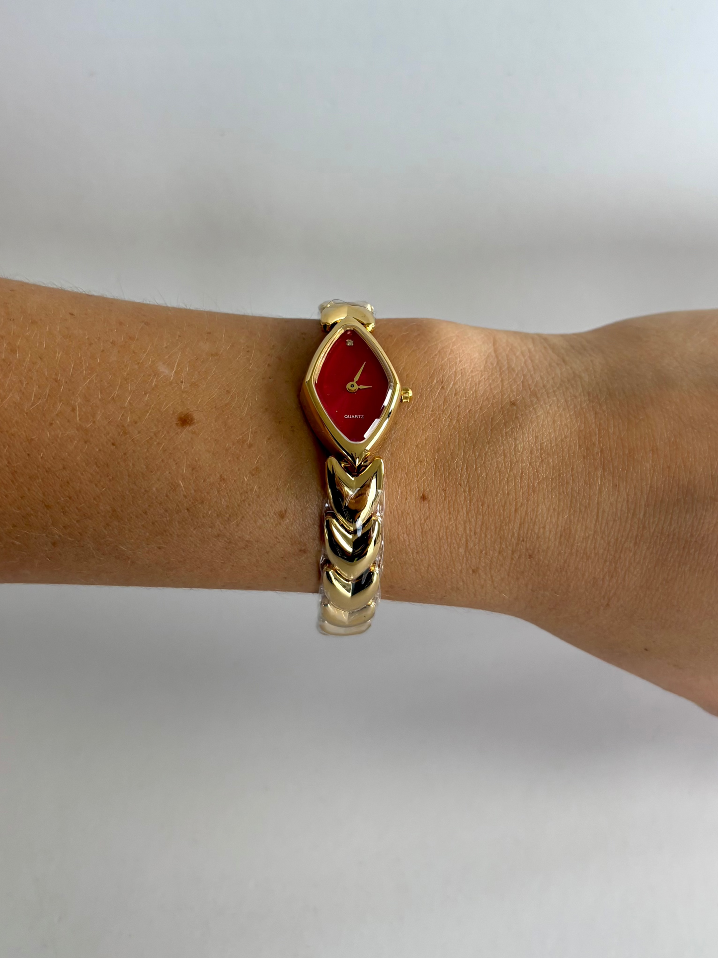 Diamond Geo Red Dial Vintage Gold Toned Womens Watch
