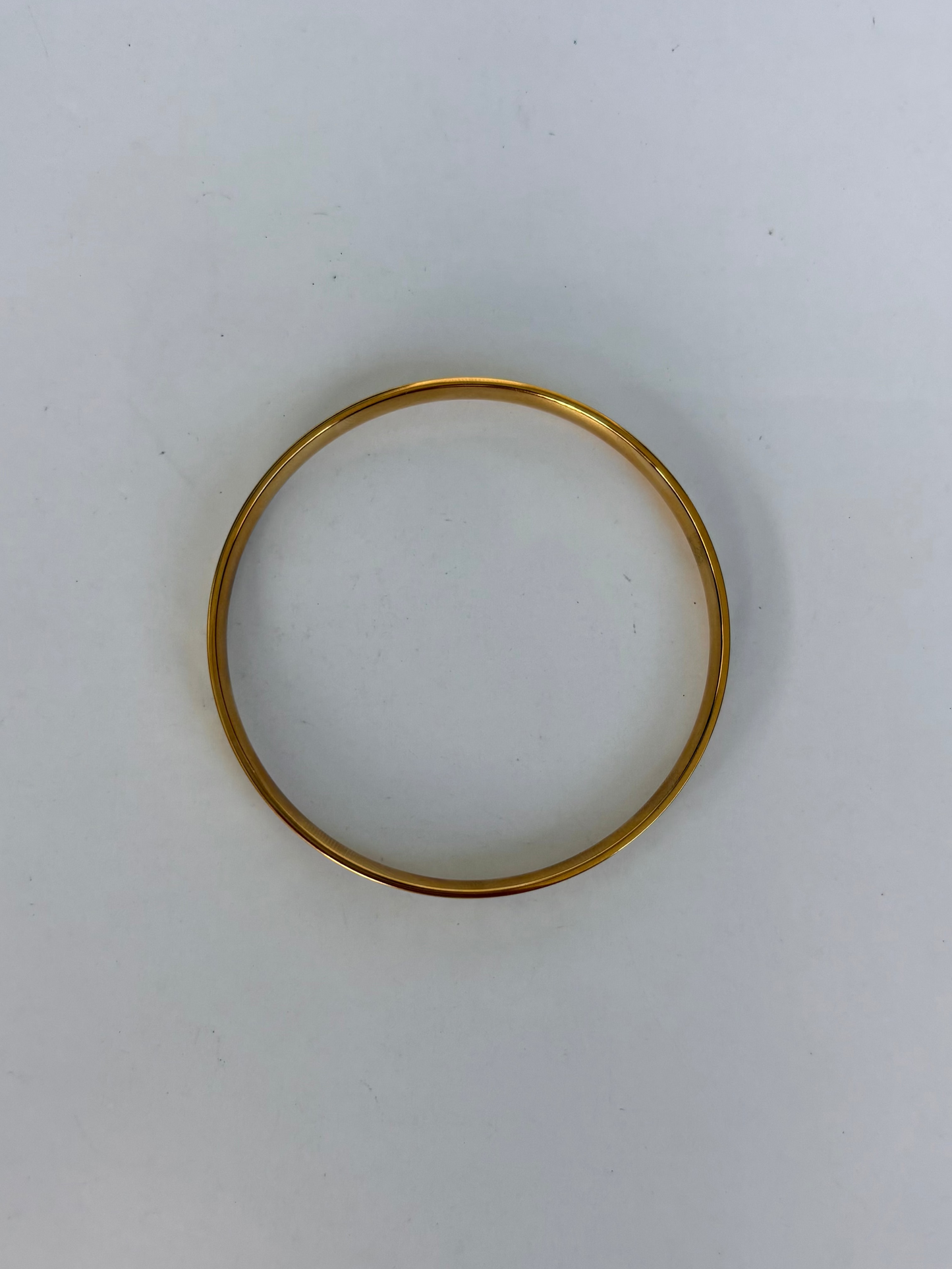 The Phoenix Gold Staple Bangle
