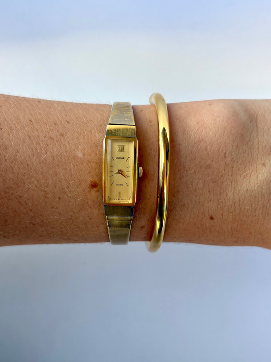 Rare Vintage Gold Toned Sleek Tiny Face Womens Watch
