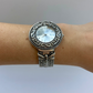 Rare Vintage Black and Silver Round Face Womens Watch