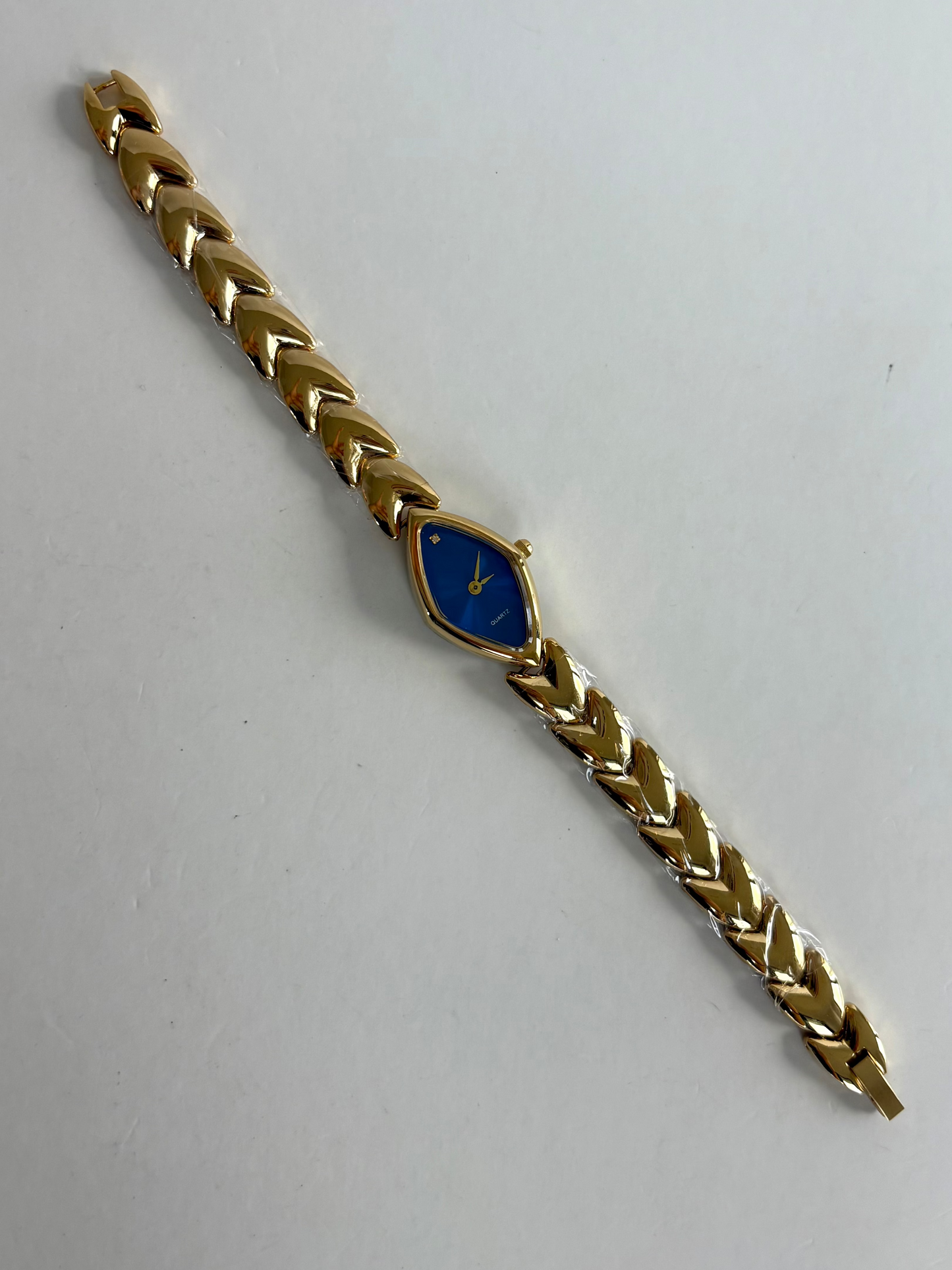 Diamond Geo Blue Dial Vintage Gold Toned Womens Watch