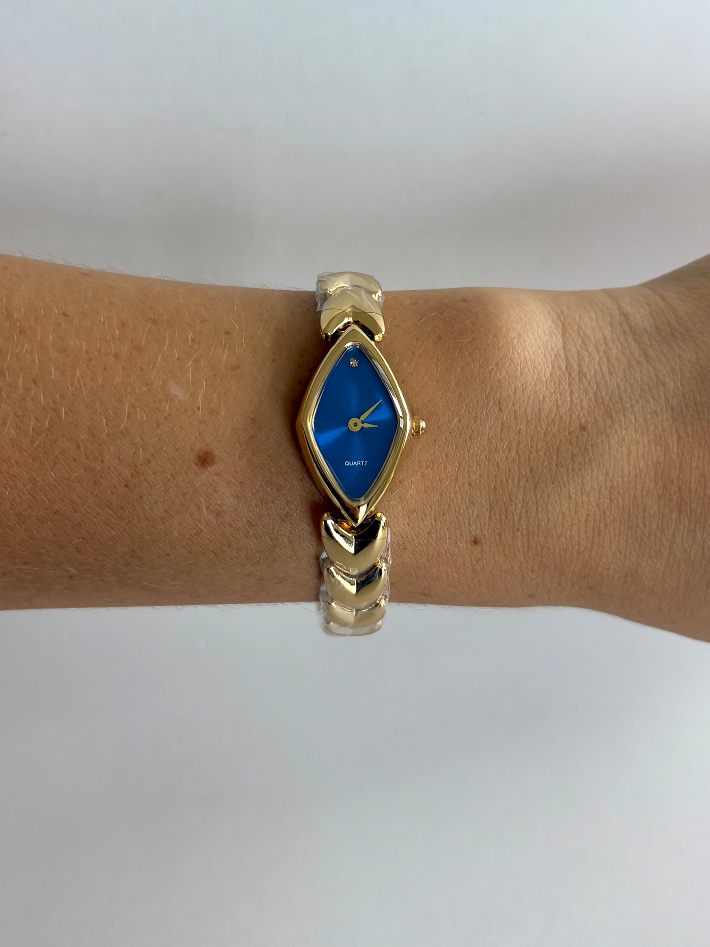 Diamond Geo Blue Dial Vintage Gold Toned Womens Watch