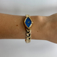 Diamond Geo Blue Dial Vintage Gold Toned Womens Watch