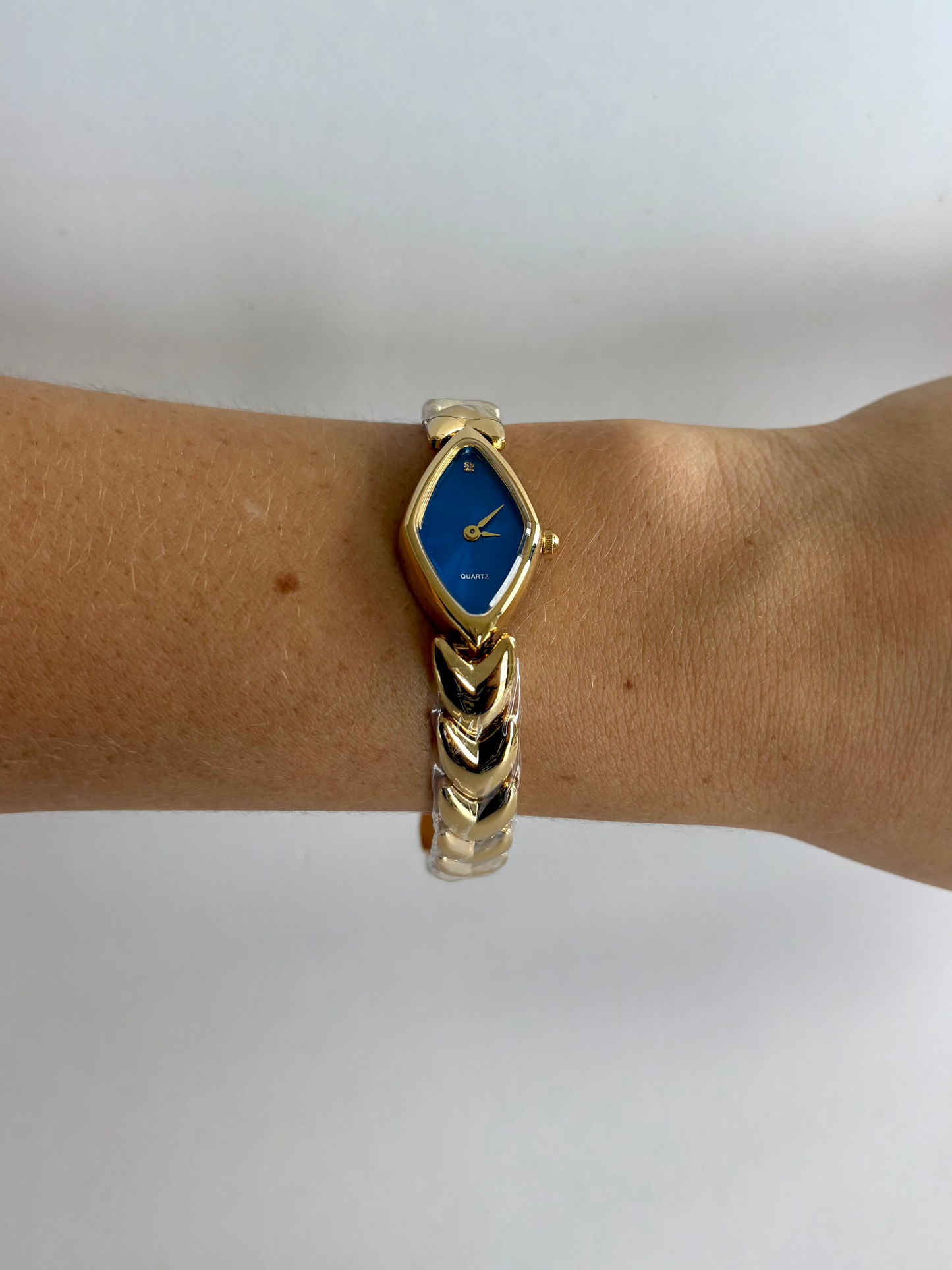 Diamond Geo Blue Dial Vintage Gold Toned Womens Watch