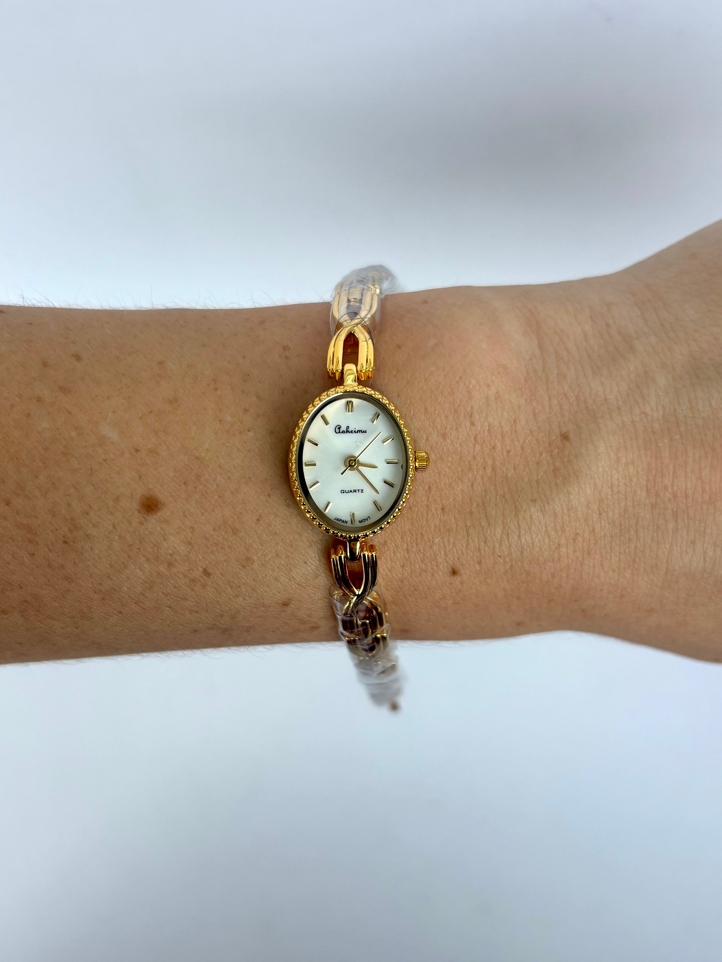 Dainty Gold Oval Dial Womens Watch