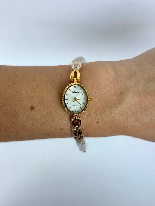 Dainty Gold Oval Dial Womens Watch