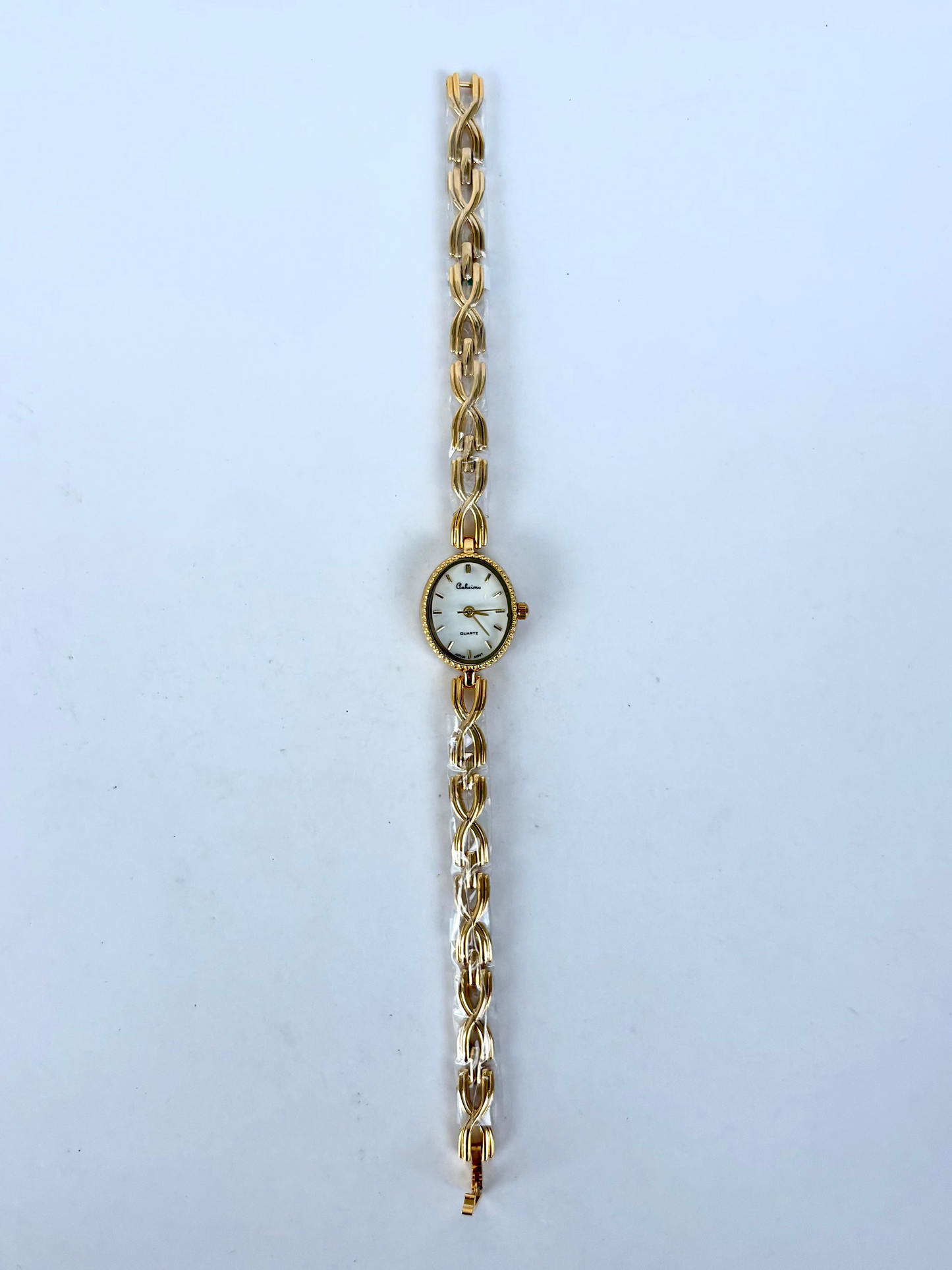 Dainty Gold Oval Dial Womens Watch