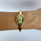 Gold Oval Dial Cusp Womens Watch