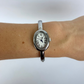 Silver Oval Dial Cusp Womens Watch