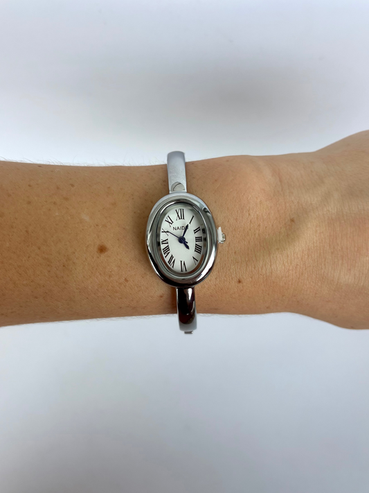 Silver Oval Dial Cusp Womens Watch