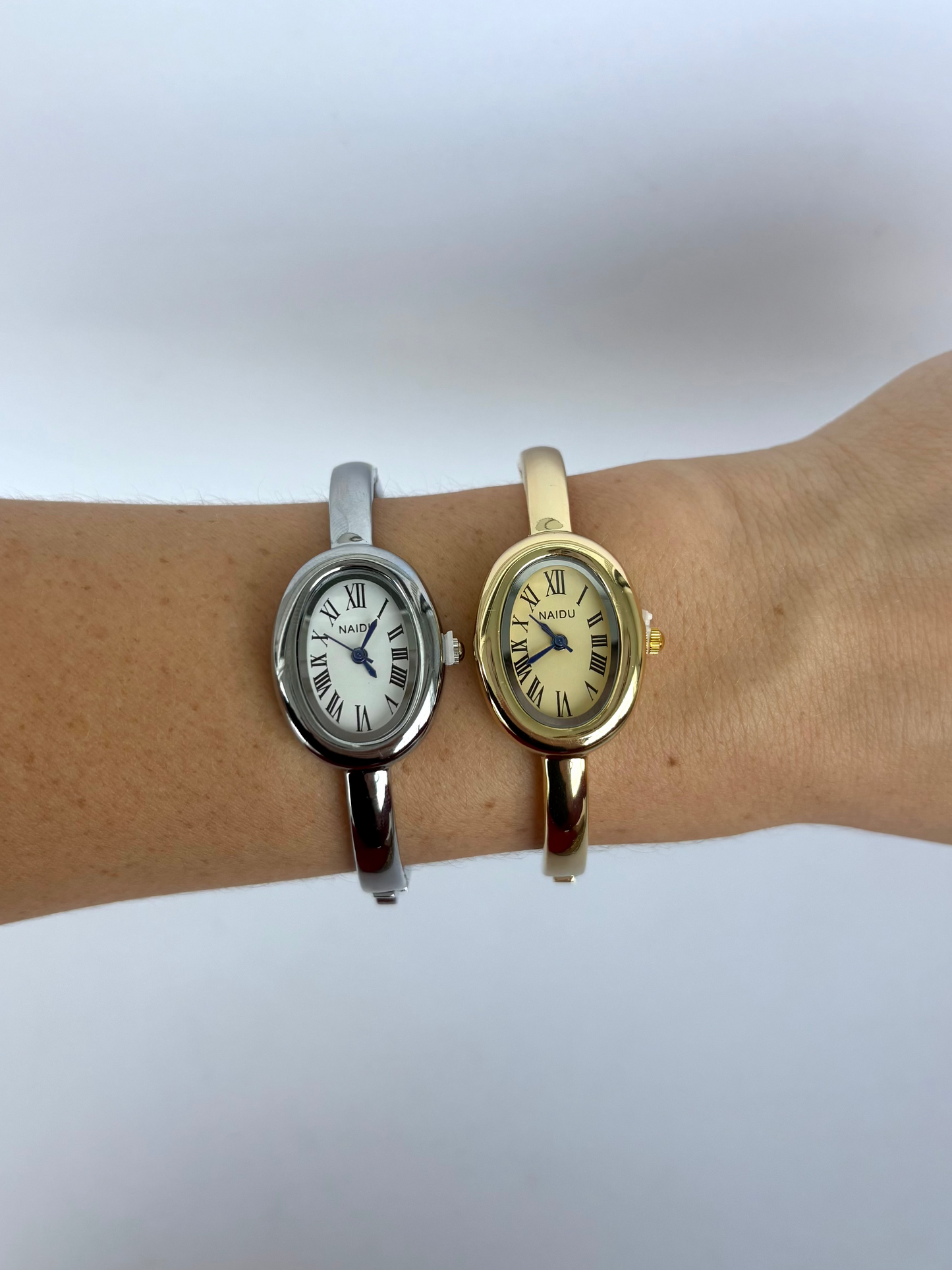Silver Oval Dial Cusp Womens Watch